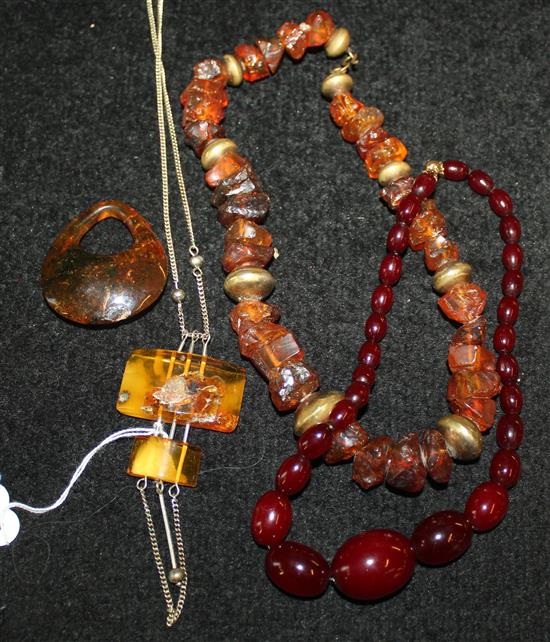 2 amber necklaces, amber pendant on chain & amber pendant (4)